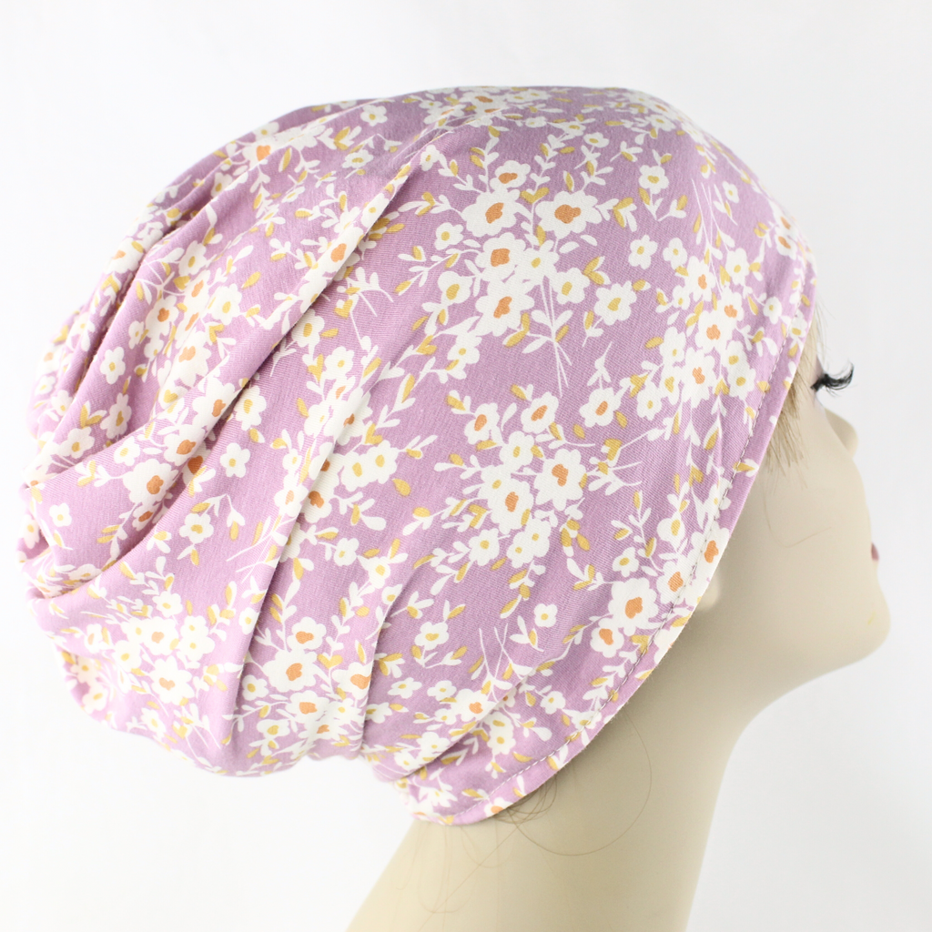 Floral-patterned headscarf on a mannequin head 