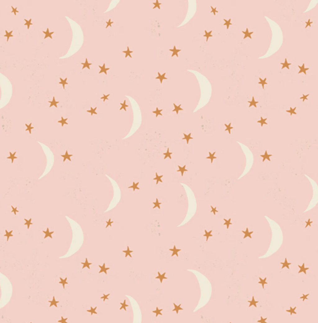 Pattern of moons and stars on a pink background